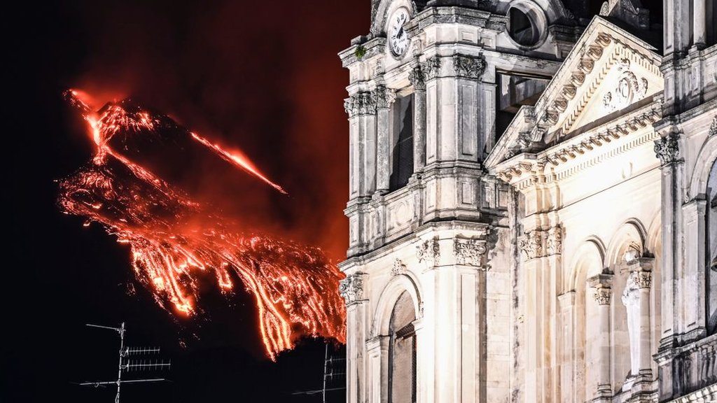 Lava spewing in the background of a cathedral