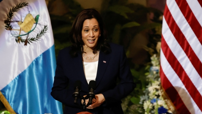 What is Kamala Harris doing on her first foreign visit?