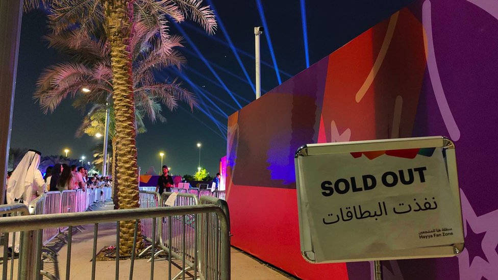 A sign saying sold out at a fan zone