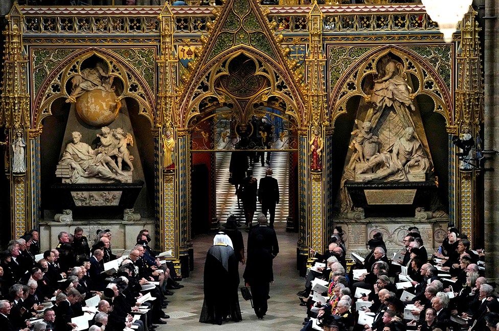 Guests arrive to take their seats inside Westminster Abbey in London on 19 September 2022, for the State Funeral Service for Britain's Queen Elizabeth II