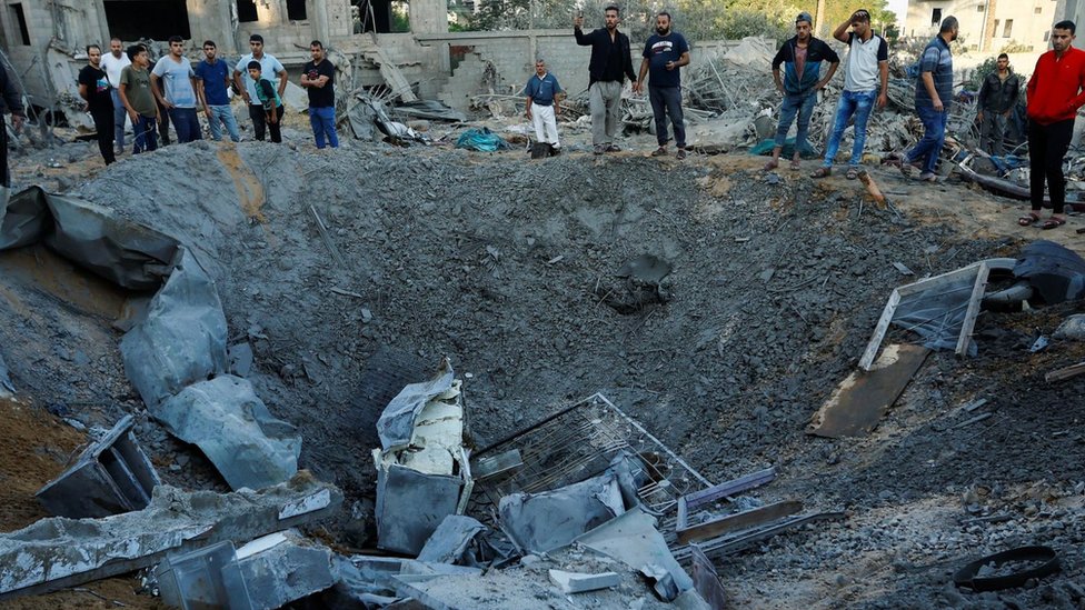 Crater in ground in Gaza