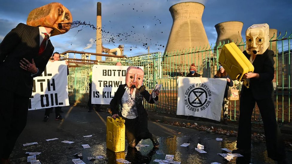 Manifestantes en la cumbre del clima en Escocia, en noviembre de 2021.