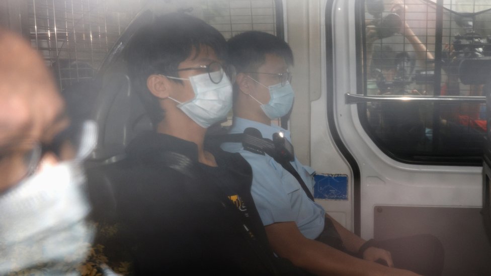 Former convenor of pro-independence group Studentlocalism, Tony Chung Hon-lam arrives at West Kowloon Magistratesâ€˜ Courts in a police van after he was arrested under the national security law, in Hong Kong, China October 15, 2020.
