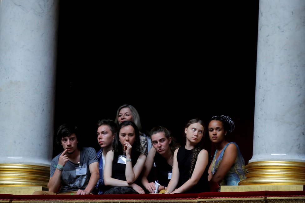 Swedish environmental activist Greta Thunberg, Ivy-Fleur Boileau, Virgile Mouquet, Adelaide Charlier and Alicia Arquetoux - French activists from the Youth for Climate movement - attend the questions to the government session at the National Assembly in Paris, France, 23 July 2019.