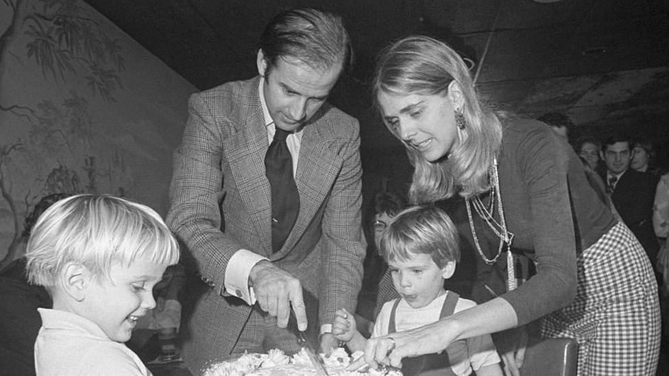 Joe Biden cuts a birthday cake with his wife Nelia in the 1970s.