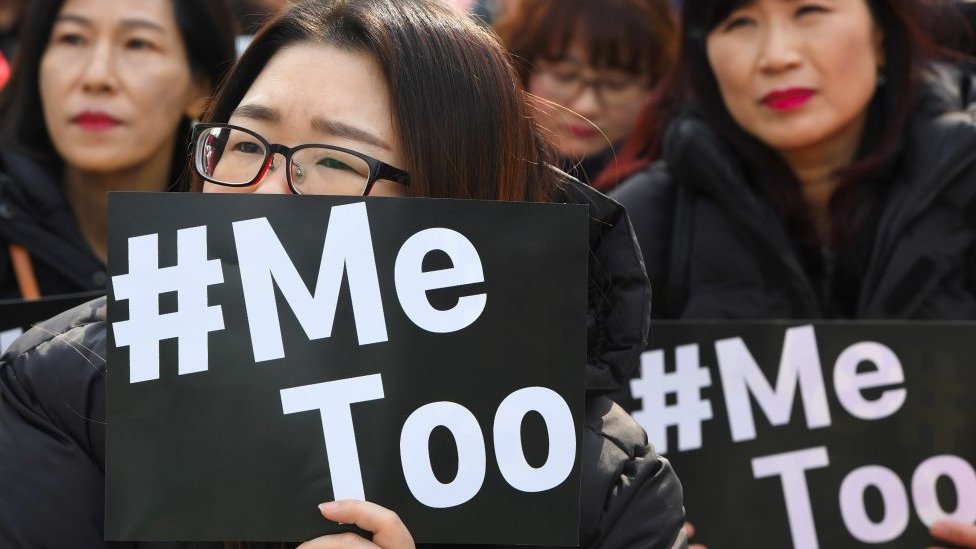South Korean demonstrators hold banners during a rally to mark International Women's Day as part of the country's #MeToo movement in Seoul on March 8, 2018