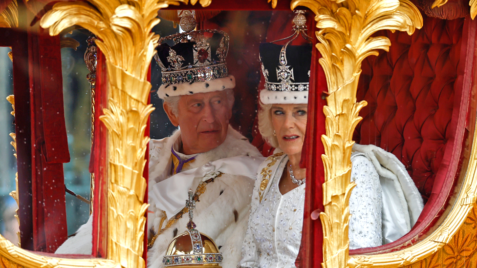 King and Queen inside Gold State Coach