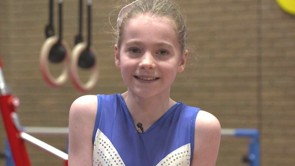 Scoliosis: Gymnast Tegan doesn't let a back brace stop her doing what she  loves - BBC Newsround
