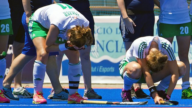 Dejected members of the Irish women's hockey team after losing to China in a penalty shoot-out