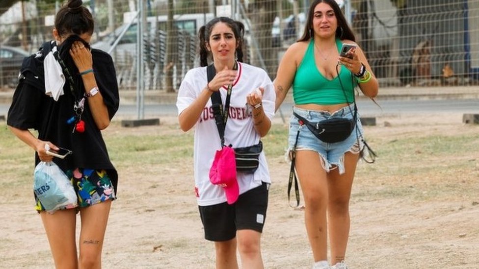 Young girls leave the Medusa Festival in Cullera, near Valencia. Photo: 13 August 2022