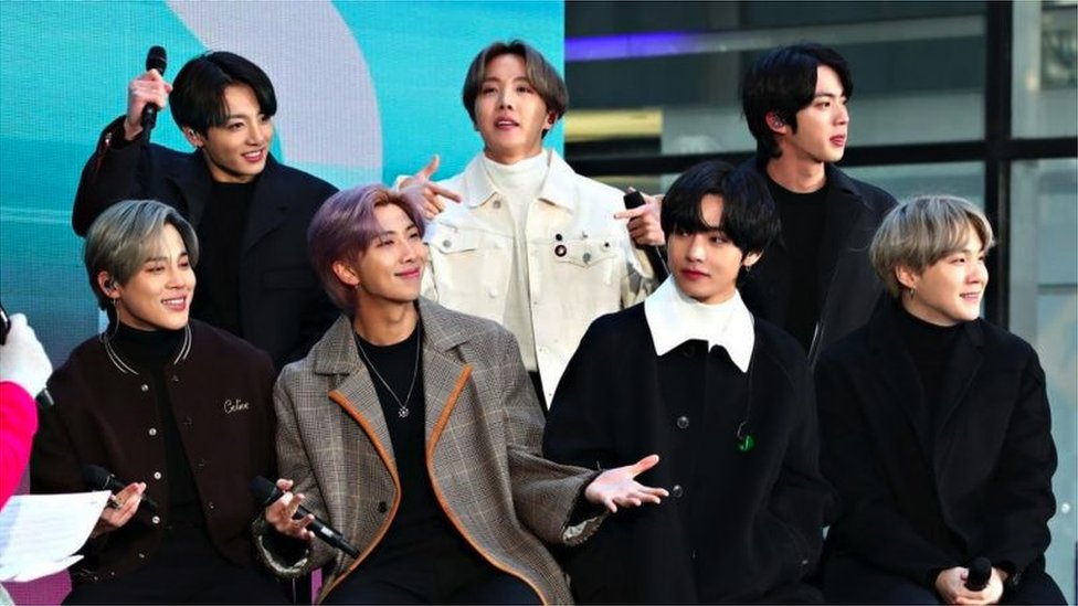 BTS pose on stage