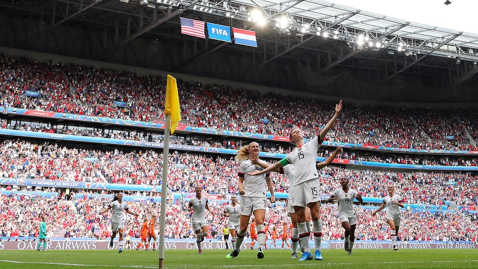 Megan Rapinoe of the USA celebrates with teammates after scoring her team's first goal during the 2019 FIFA Women's World Cup France Final match between The United State of America and The Netherlands at Stade de Lyon on July 07, 2019 in Lyon, France.