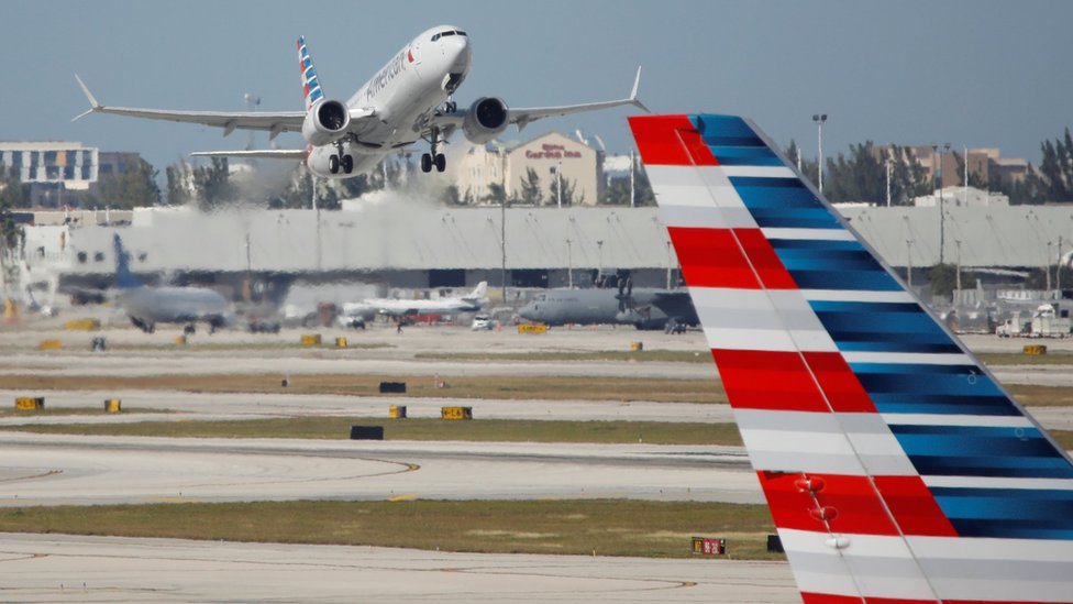 Рейс 718 American Airlines, первый коммерческий рейс Boeing 737 MAX в США после того, как регуляторы отменили 20-месячный запрет на посадку в ноябре, вылетает из Майами, Флорида, США 29 декабря 2020 г.