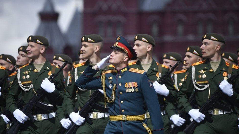 Russian servicemen march on Red Square during the Victory Day military parade in central Moscow on May 9, 2022