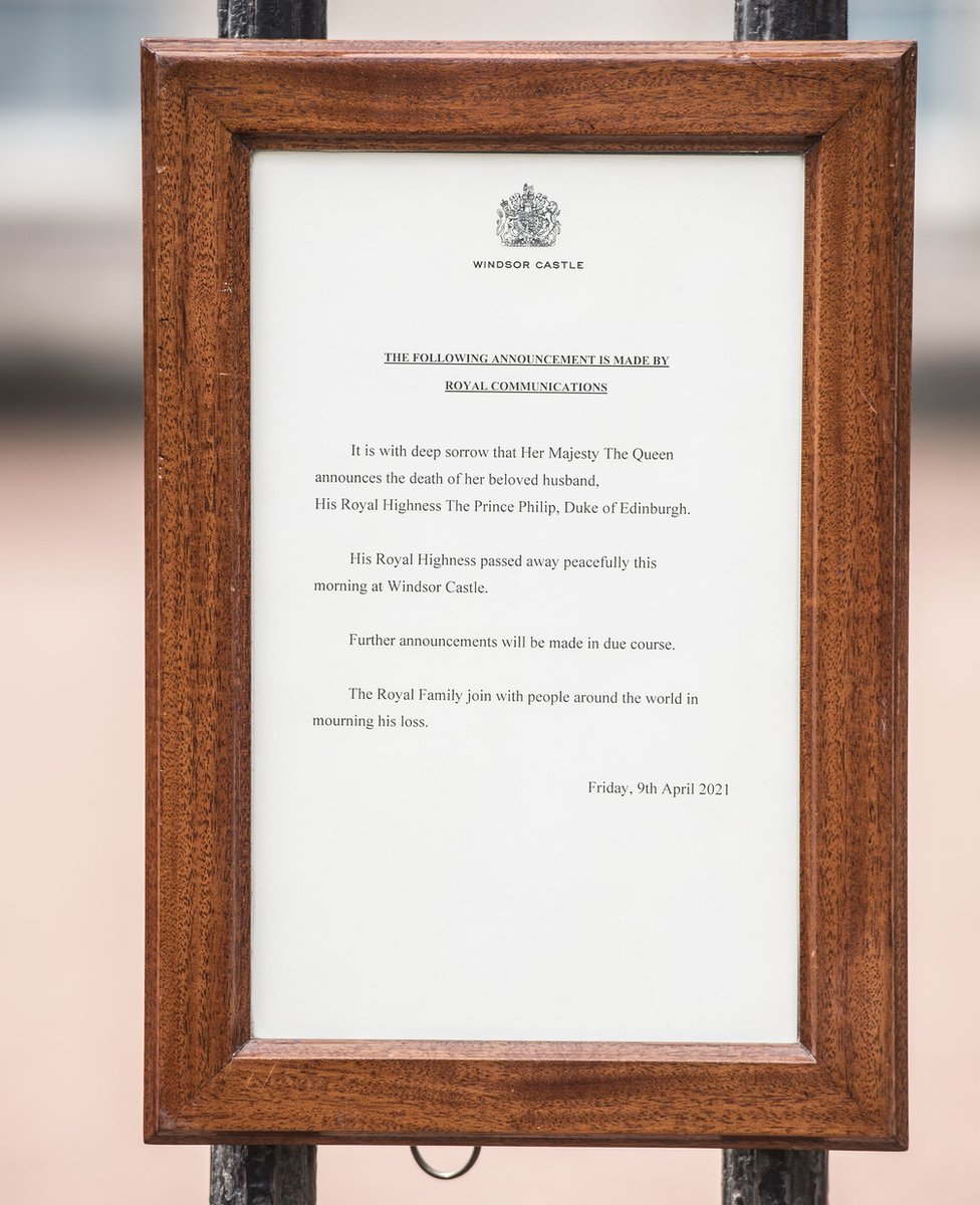 A notice announcing Prince Philip's death attached to the gates at Buckingham Palace