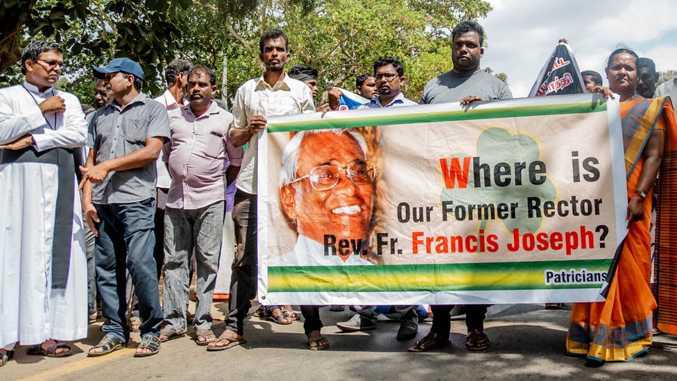 Protesters holding a banner in Killinochchi, northern Sri Lanka