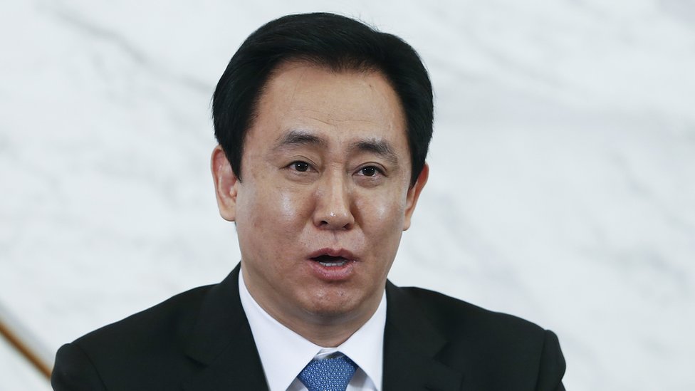 Evergrande: China property giant and its founder accused of $78bn fraud