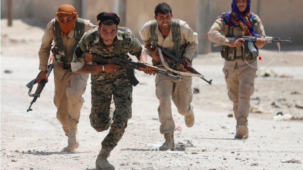 US-backed Kurdish forces impose curfew in eastern Syria after new clashes  with rival Arab militia