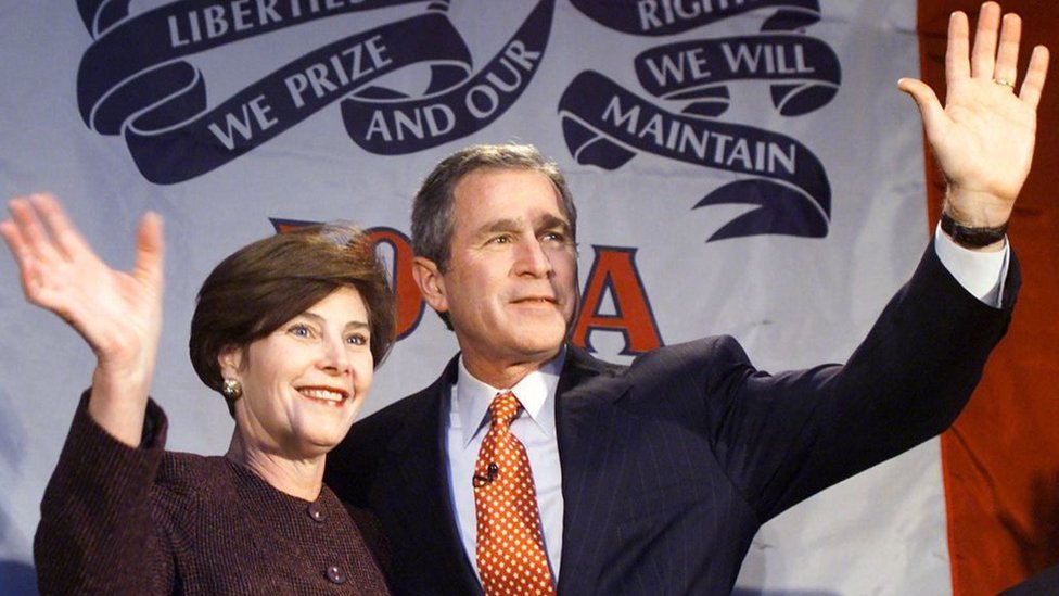 George W Bush with his wife Laura after winning the Iowa primary