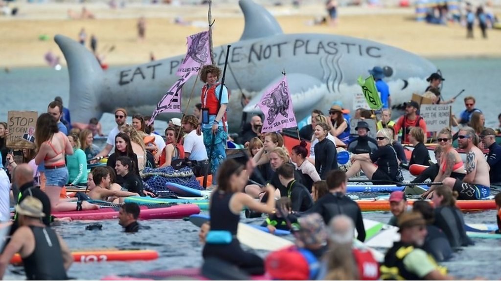 G7 in Cornwall: Environmental protesters take to streets and sea