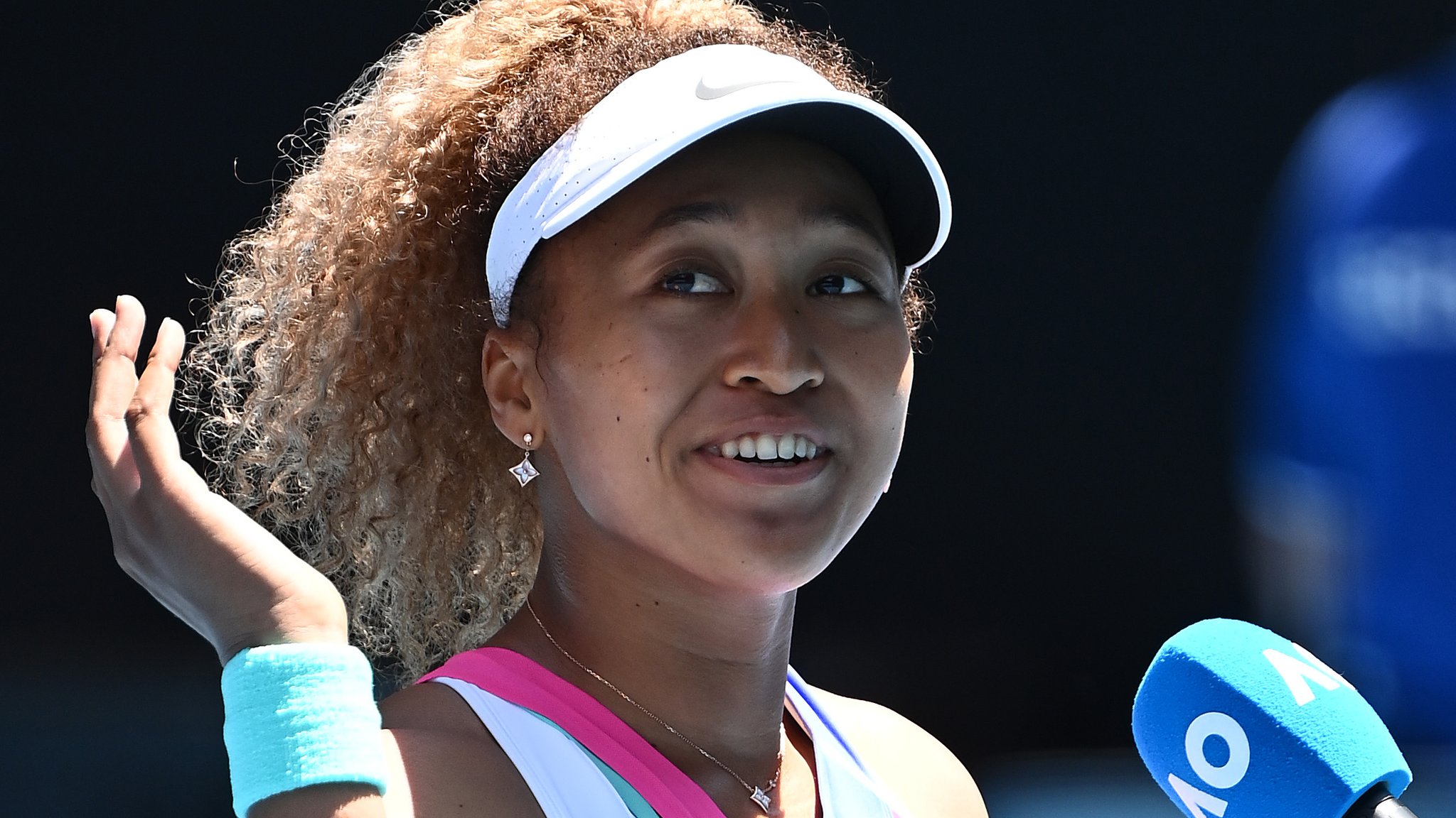 Australian Open: Naomi Osaka starts title defence with dominant win