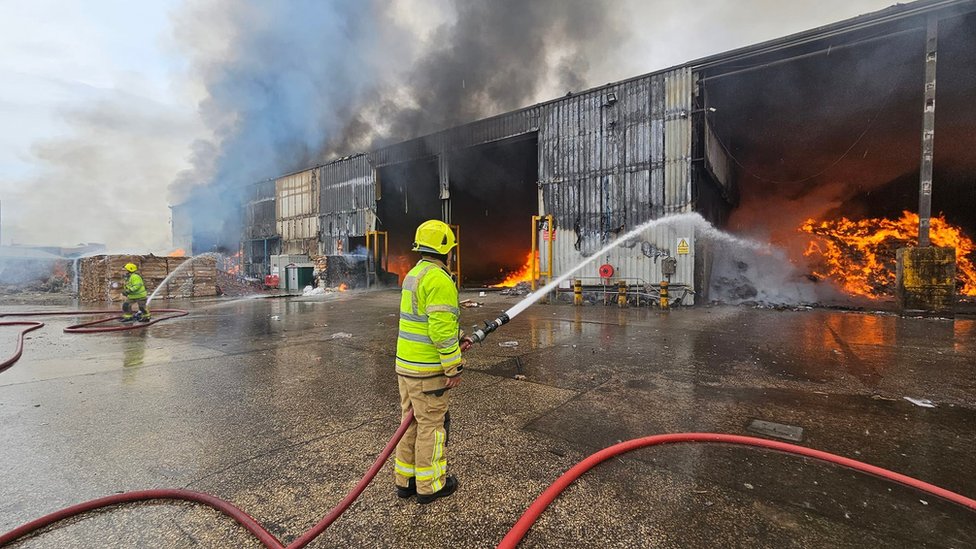 Sheffield firefighters tackle large blaze at recycling centre - BBC News