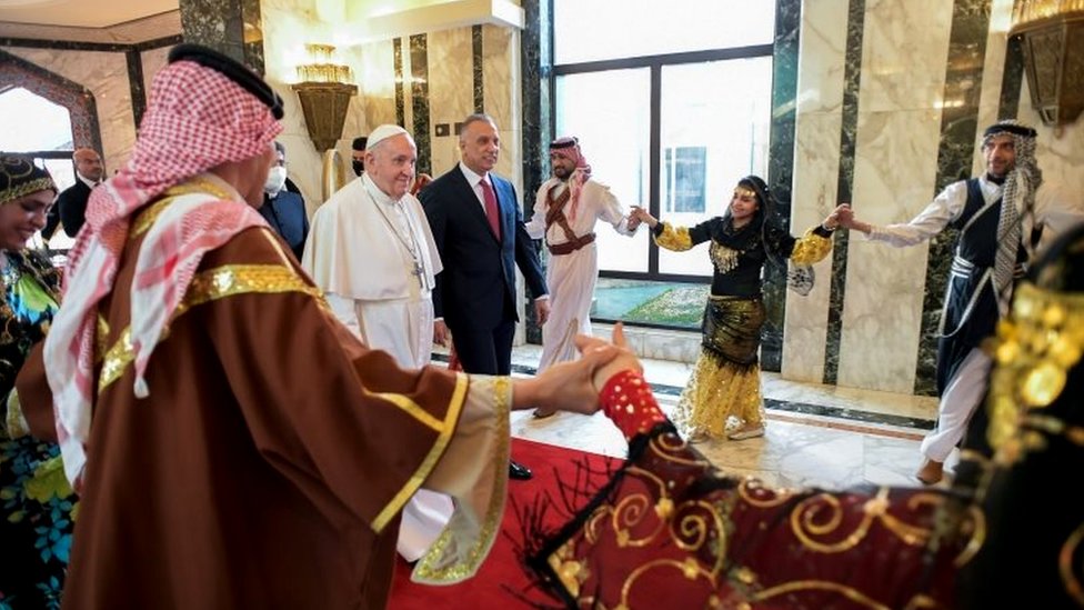The Pope was greeted by Iraq's PM and dancers at the airport in Baghdad