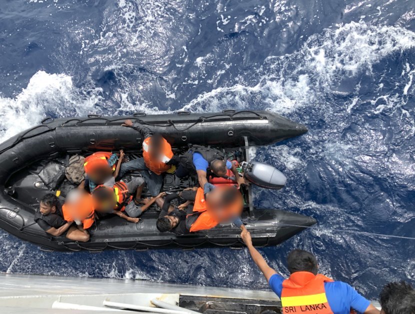 Sri Lankan Navy rescuing a group of migrants