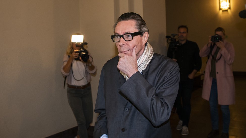 المصور الفرنسي جان-كلود أرنو، خلال المحاكمة