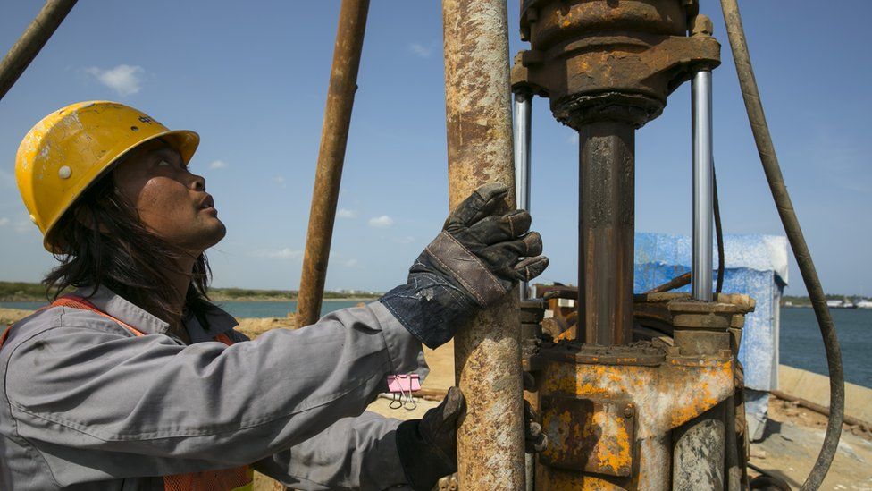 Pekín le ha otorgado préstamos a decenas de naciones. (Foto: Paula Bronstein) Trabajador chino (Foto: Paula Bronstein)