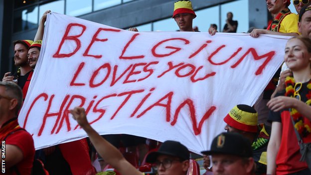 Belgium fans with an Eriksen banner