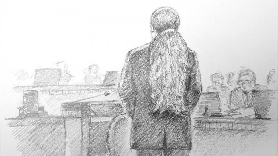 This courtroom sketch illustrated by Masato Yamashita depicts Satoshi Uematsu, accused of the 2016 murder of 19 disabled people at a Japanese care home, attending his first hearing at the Yokohama District Court in Yokohama, Kanagawa prefecture on January 8, 2020