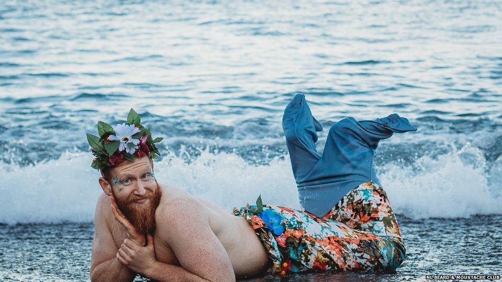 Bearded Canadians pose as 'mermen' for charity calendar - BBC News