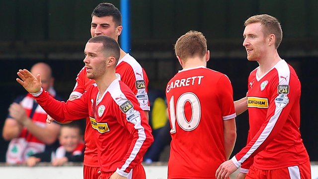 Cliftonville players celebrate victory over Dungannon Swifts