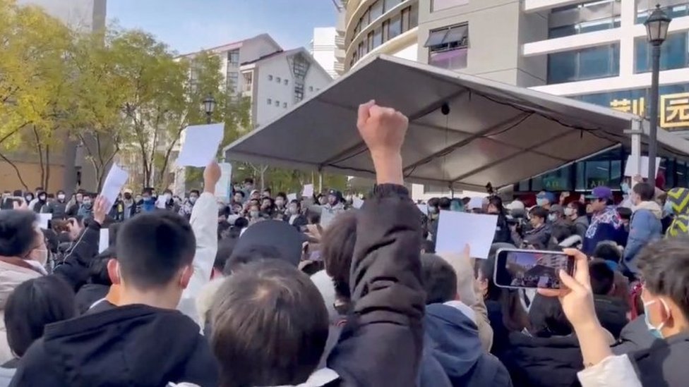 Students take part in a protest against COVID-19 curbs at Tsinghua University in Beijing, China seen in this still image taken from a video released November 27, 2022 and obtained by REUTERS