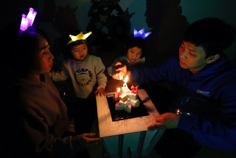 One family in Seoul lit a candle and shared a cake to start 2021