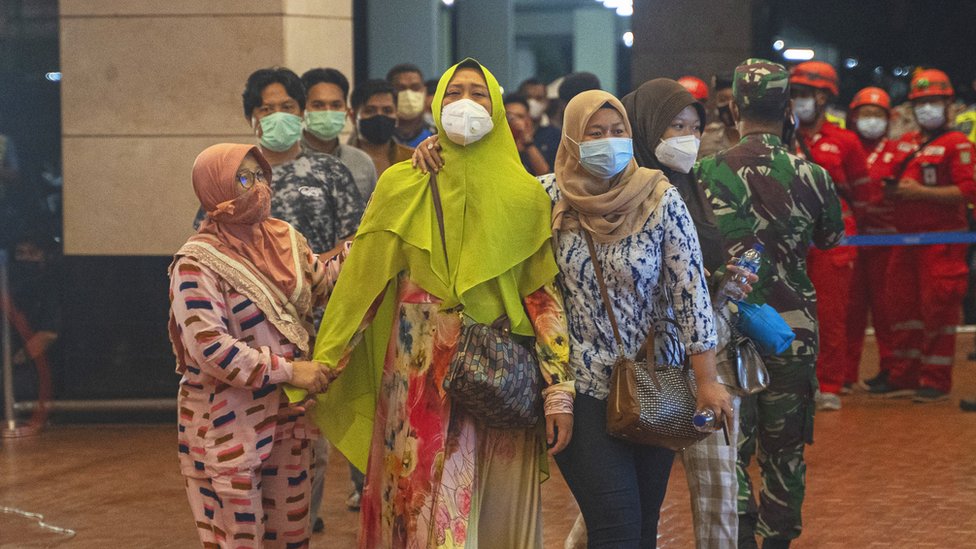 Relatives of people on Sriwijaya Air flight SJ 182 arrive at the crisis centre in Soekarno Hatta Airport, on 9 January 2021 in Jakarta, Indonesia