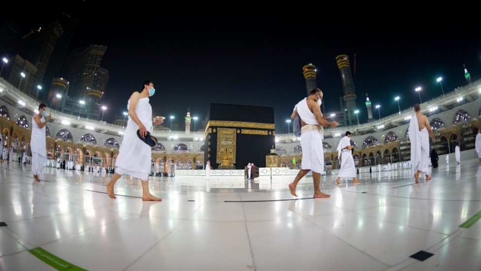 Muslims keep a safe social distance while performing Umrah at the Grand Mosque on 3 October 2020