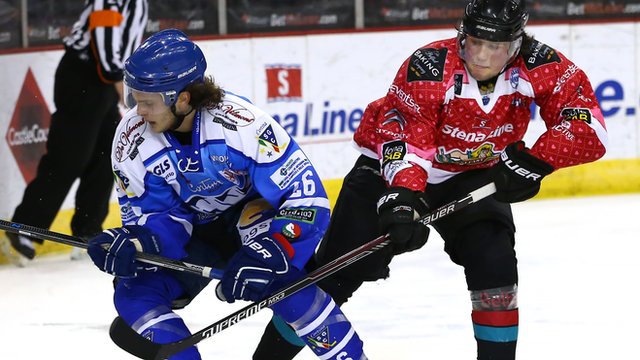 SG Cortina's Tobias Brighenti in action against Belfast Giants debutant Adam Robinson