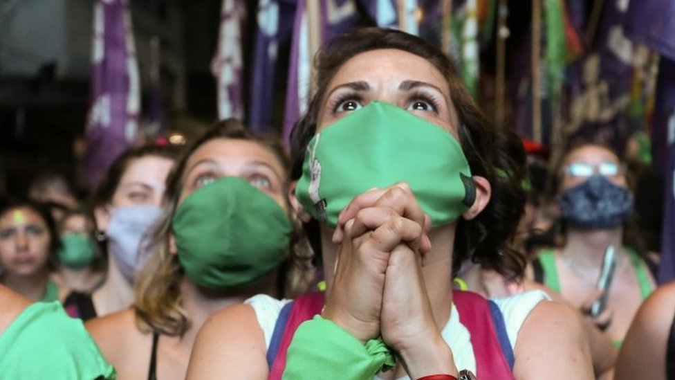 A demonstrator in favour of legalizing abortion reacts as the senate debates an abortion bill, in Buenos Aires, Argentina, December 30, 2020.