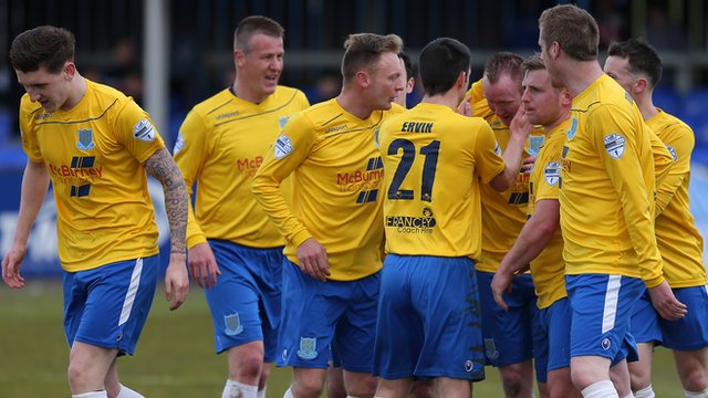 Ballymena United players celebrate victory over Dungannon Swifts at Stangmore Park