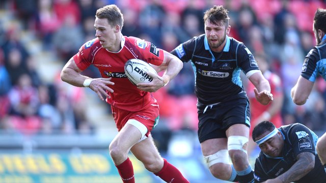 Liam Williams of the Scarlets beats the Glasgow defence to score his team's only try against the Warriors