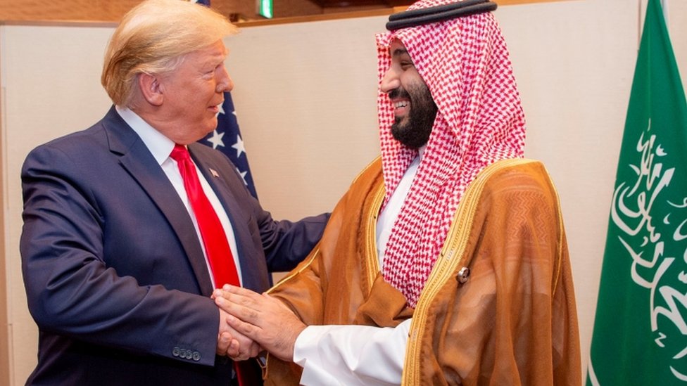 Saudi Arabia's Crown Prince Mohammed bin Salman shakes hands with US President Donald Trump, 