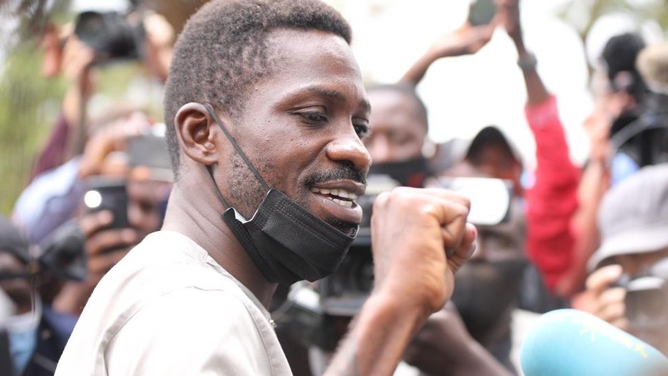 Bobi Wine greeting supporters as he voted in Kampala, Uganda - 14 January 2021