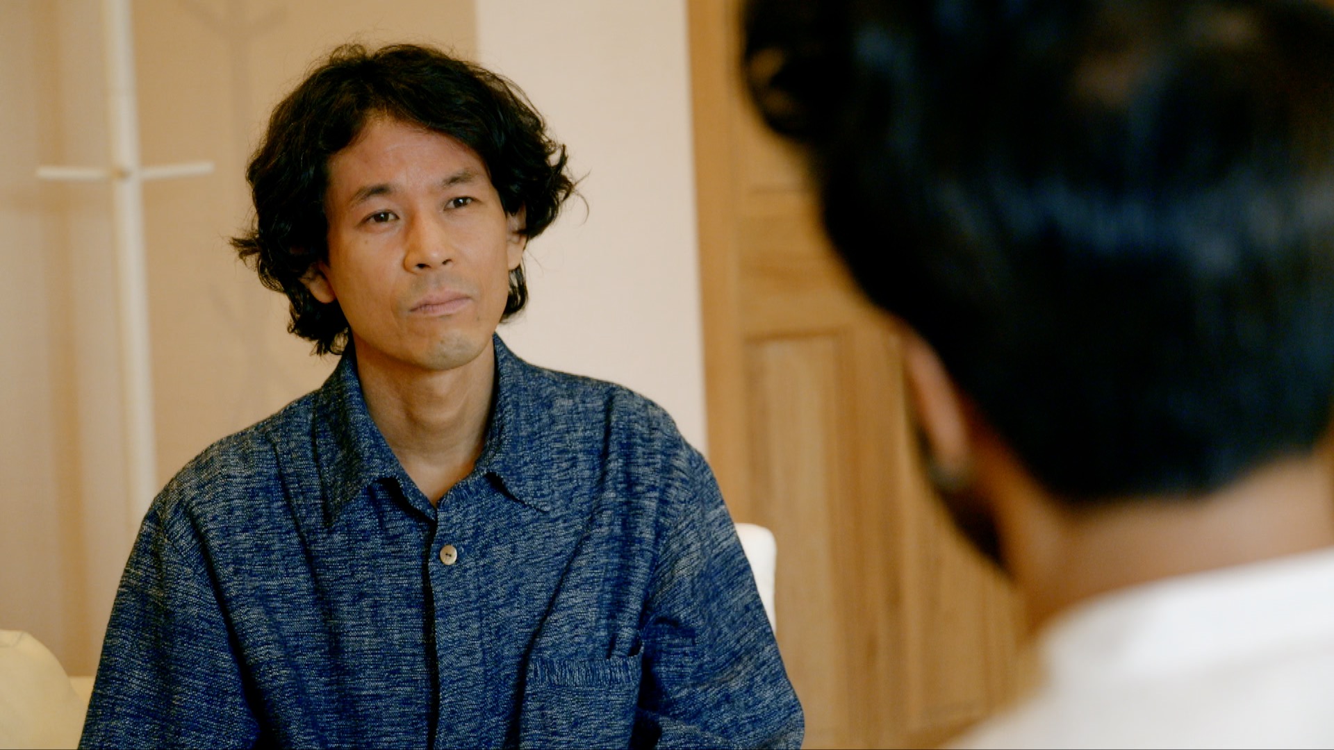 Therapist Nobuki Yamaguchi being interviewed for the documentary