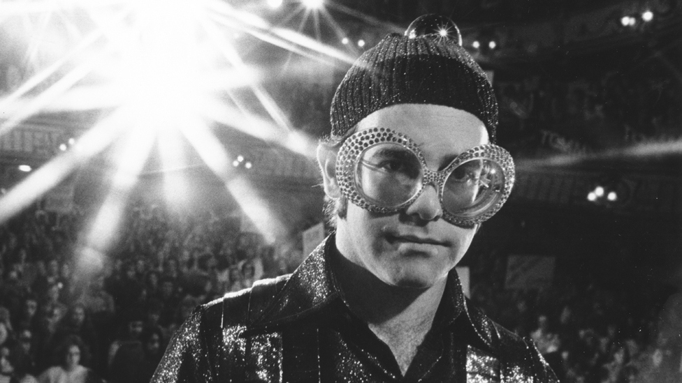 ELTON JOHN'S CRAZIEST LOOKS EXPLAINED (A Rocketman Fashion History) 