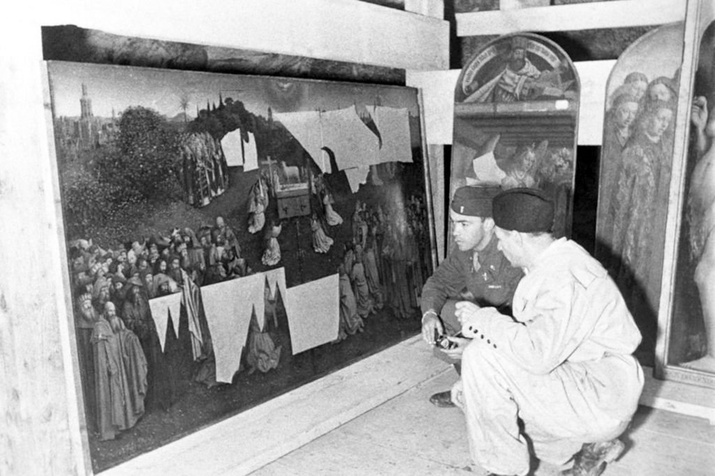 "Monuments Men" examining the Ghent Altar in 1945, in the Altaussee salt mine, Austria.