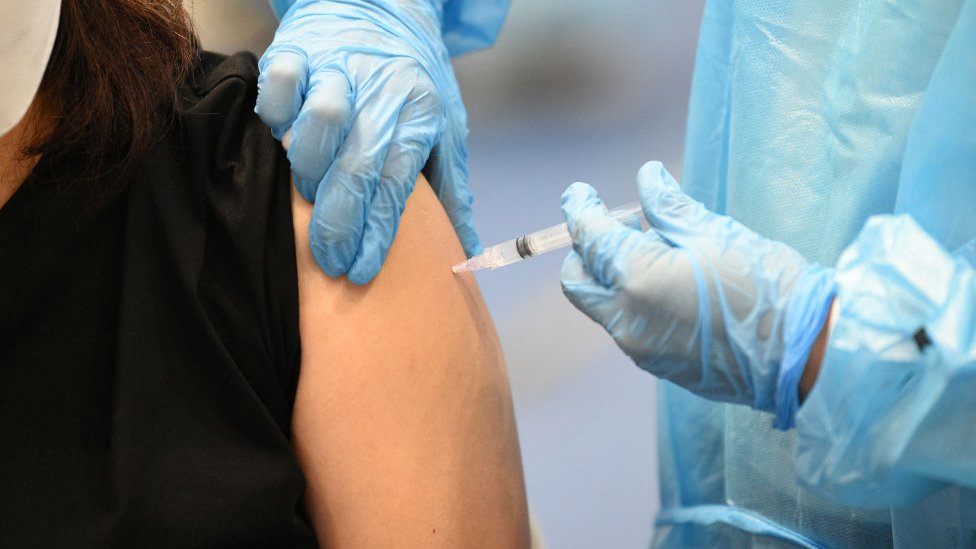 A person getting vaccinated against the coronavirus.