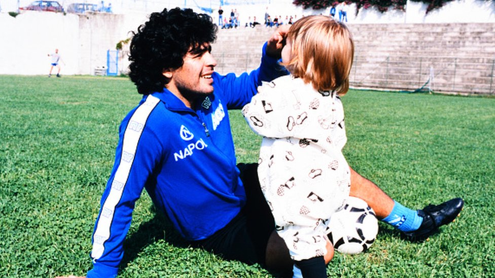 Maradona of Napoli plays with his daughter Dalma in 1989