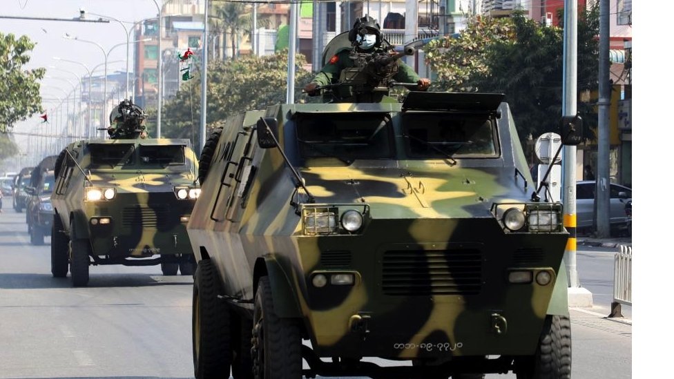 Armoured personnel carriers are seen on the streets of Mandalay on 3 February 2021